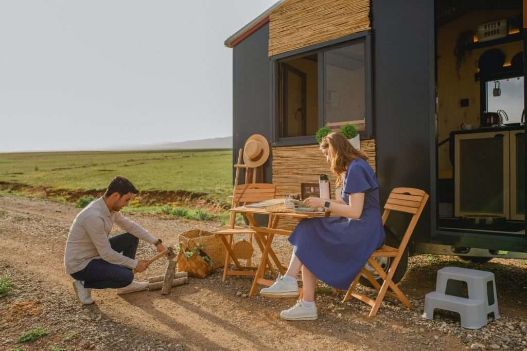 Couple enjoying the outside of the RV