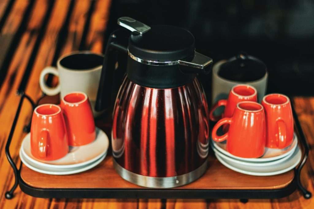 coffee mugs tray on a wooden table